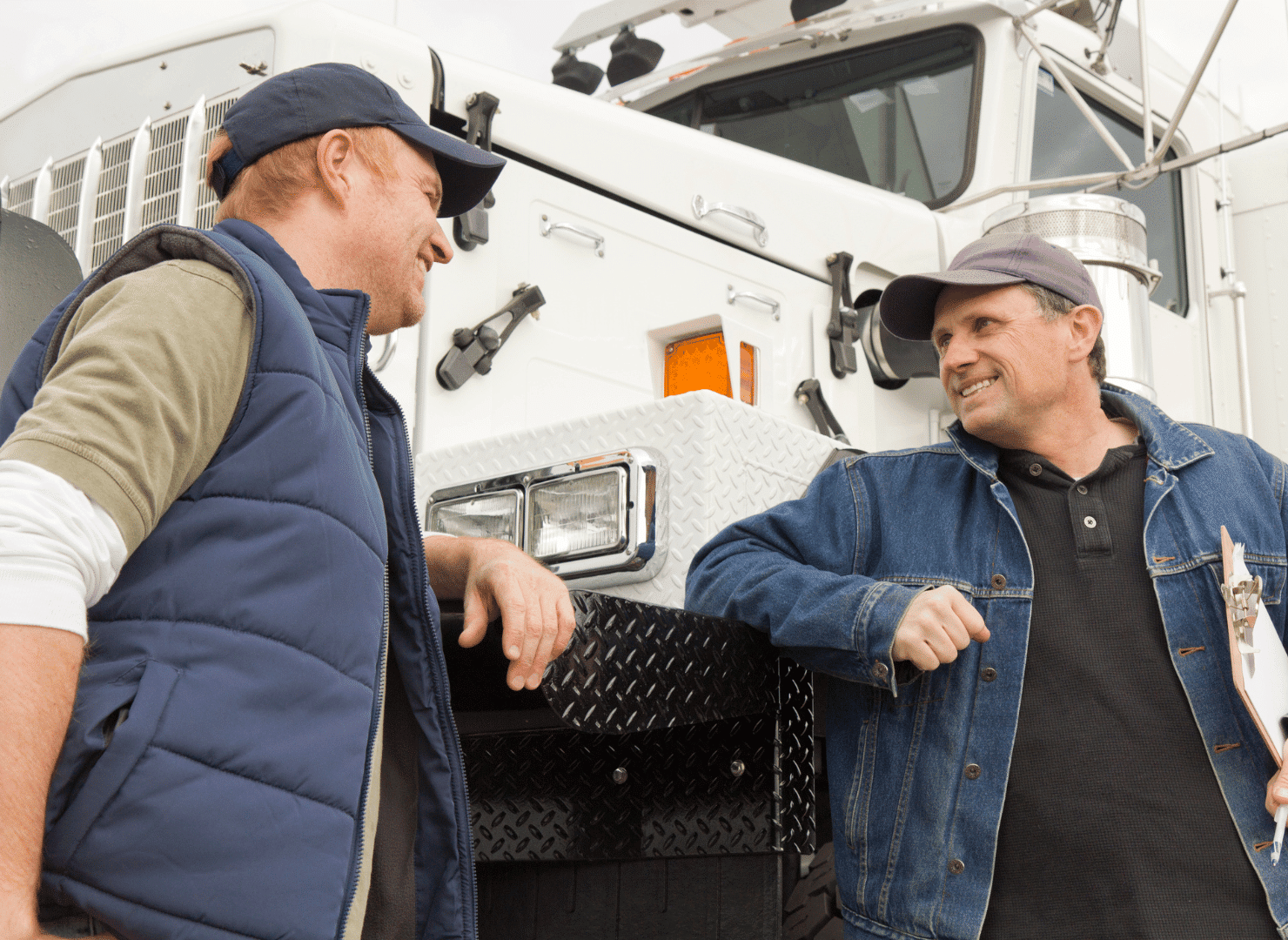 Men talking to each other outside