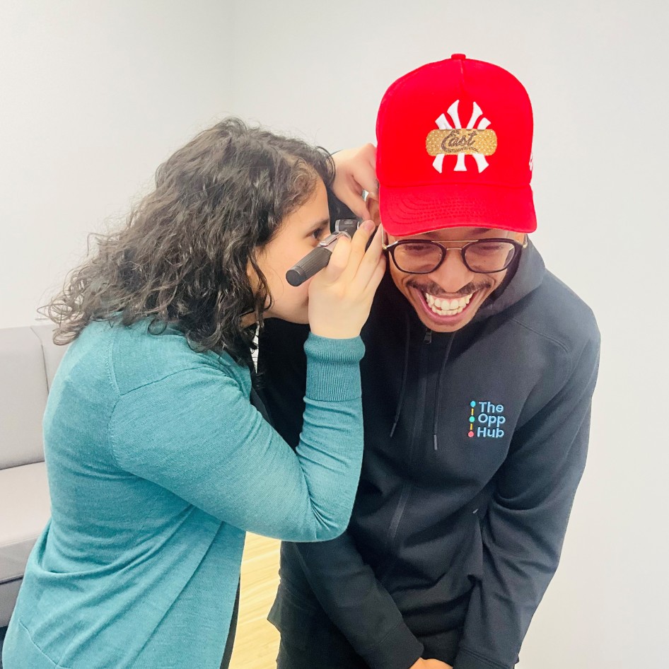 Audiologist performing test