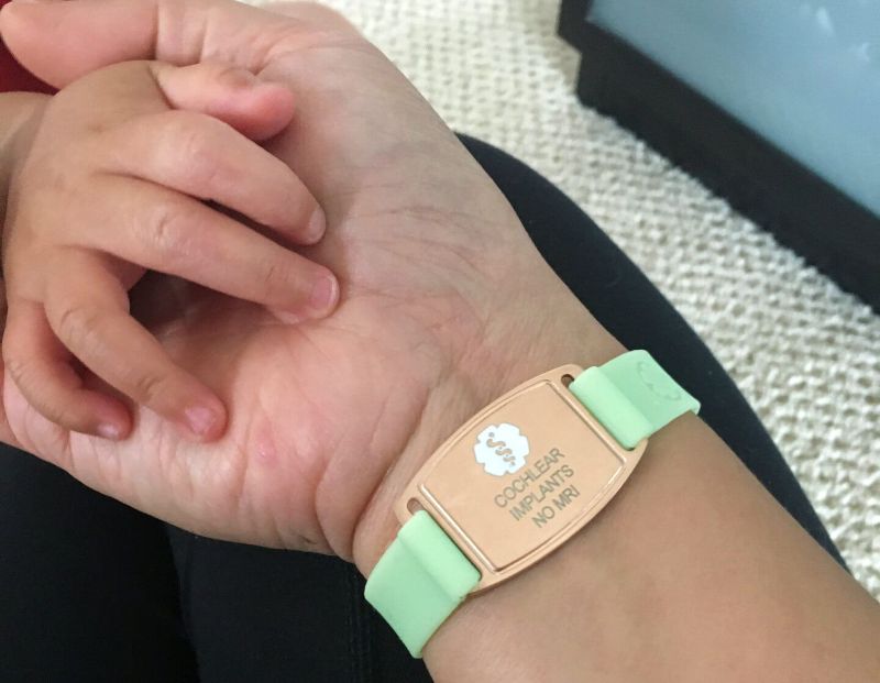 A medical ID bracelet that says