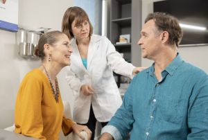 A man discusses hearing loss with his audiologist