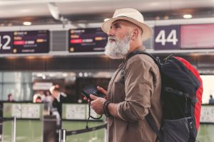 A man at a noisy airport.