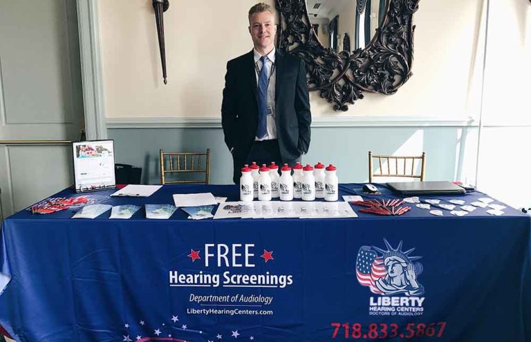 Audiologist at the Senior Health Fitness Expo table