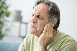 A man suffering from tinnitus.